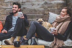 a couple with a pug